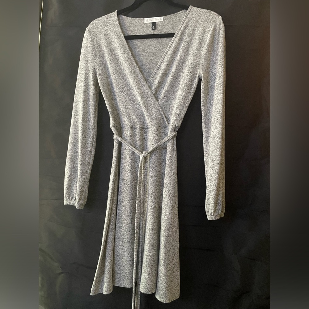 Planet Gold Size S polyester rayon spandex. Stretchy no pillage stains or tears.